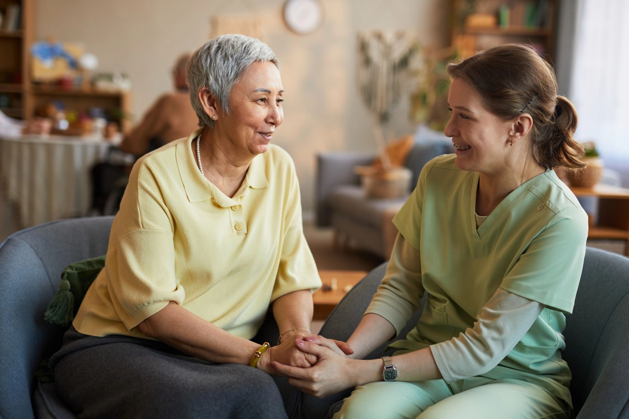 Caregiver supporting a senior during a home visit